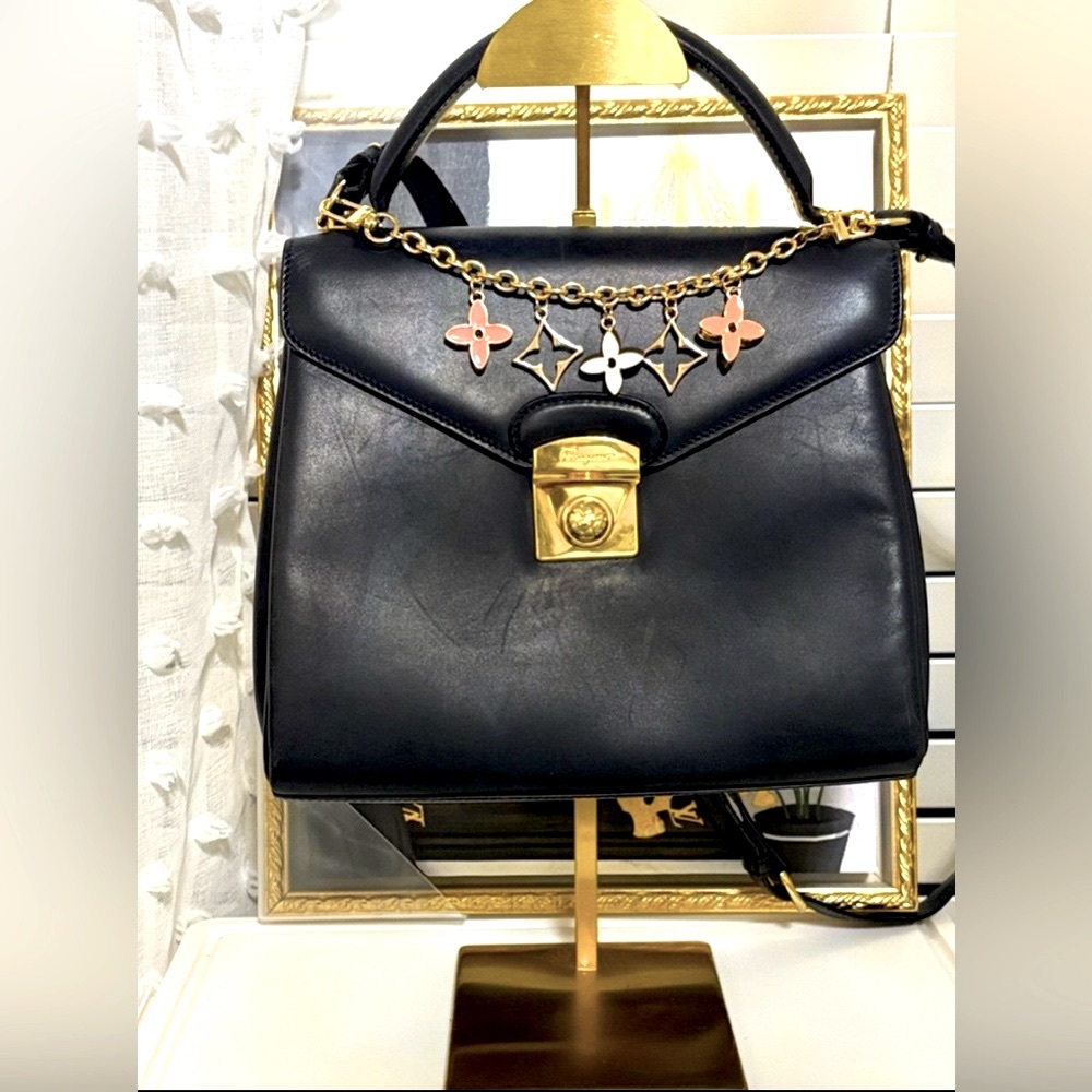 EUC Ferragamo Elegant Black Leather Handbag with Gold Accents